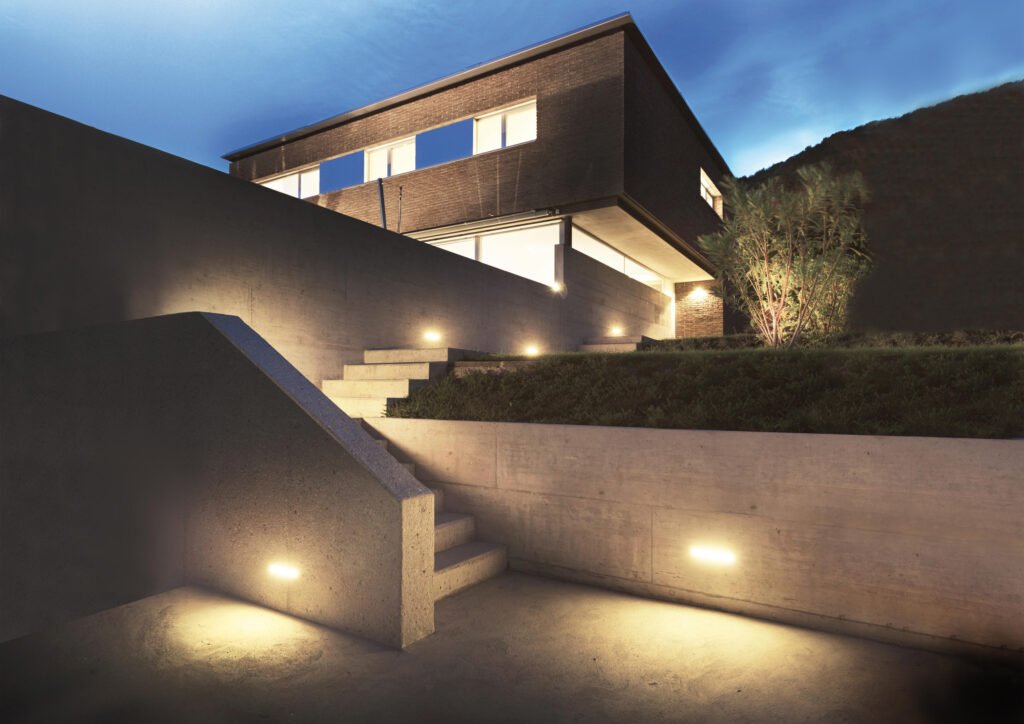 How the Right Outdoor Lighting Fixtures Completely Change a Home's Look 1 Tru-scapes.com Concrete lighting